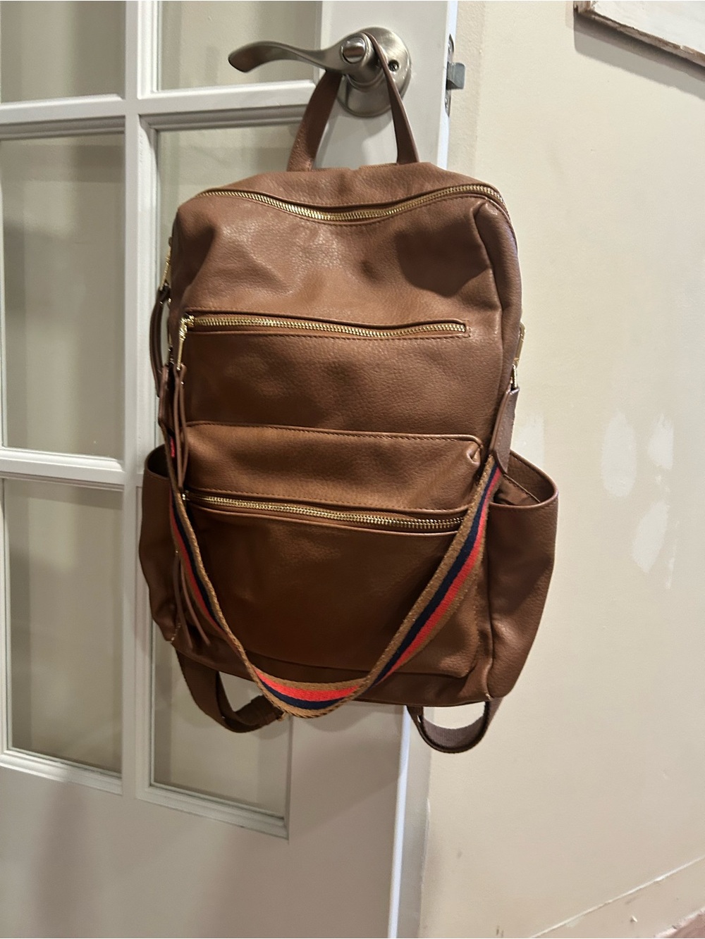 Classic Brown Leather Women's Backpack with Striped Shoulder Strap